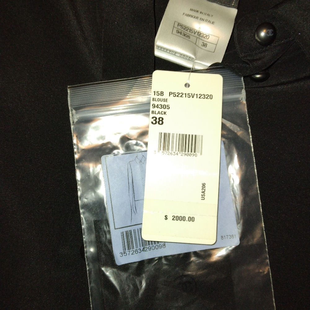 Chanel black button up sleeveless shirt
